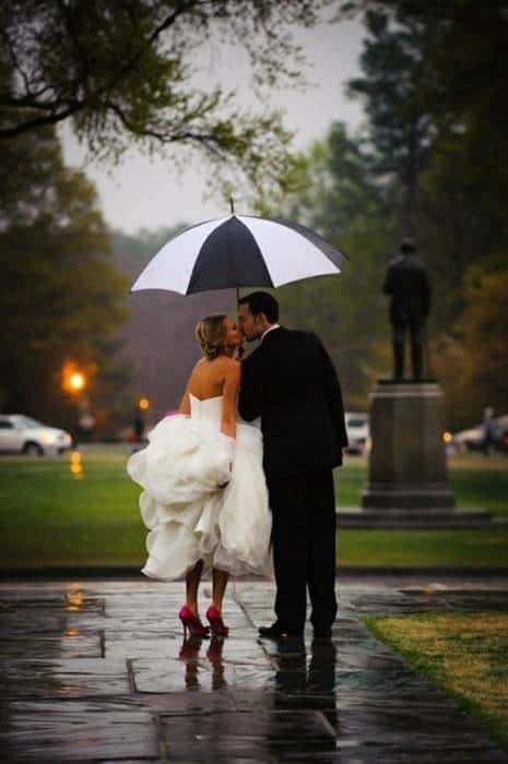 What to do If It Rains on Your Wedding Day Rainy Wedding Photo