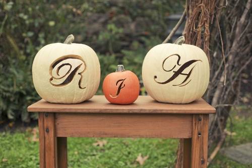 Initials Carved into Pumpkins