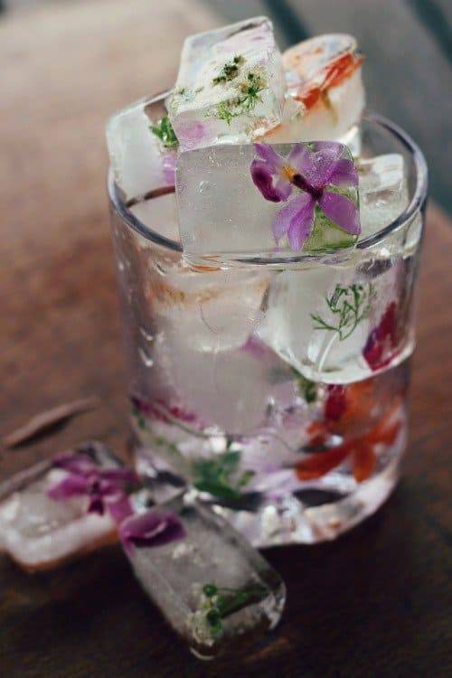 lust!!! freeze edible flowers in once-boiled water (less bubbles) by boiling and cooling water then pouring in a bit, freeze, add flowers and pour in more, freeze, then do an extra layer of flowers if you please….gorgeous!!! much more on what where &...