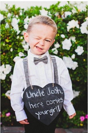 How to Make Sure Your Flower Girl and Ring Bearer Get It Right Ring Bearer with Sign
