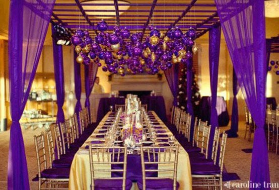 Interior design with a gold and purple wedding color palette