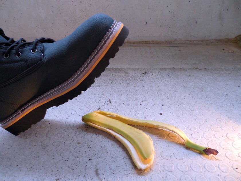 A picture containing ground, indoor, floor, banana Description automatically generated