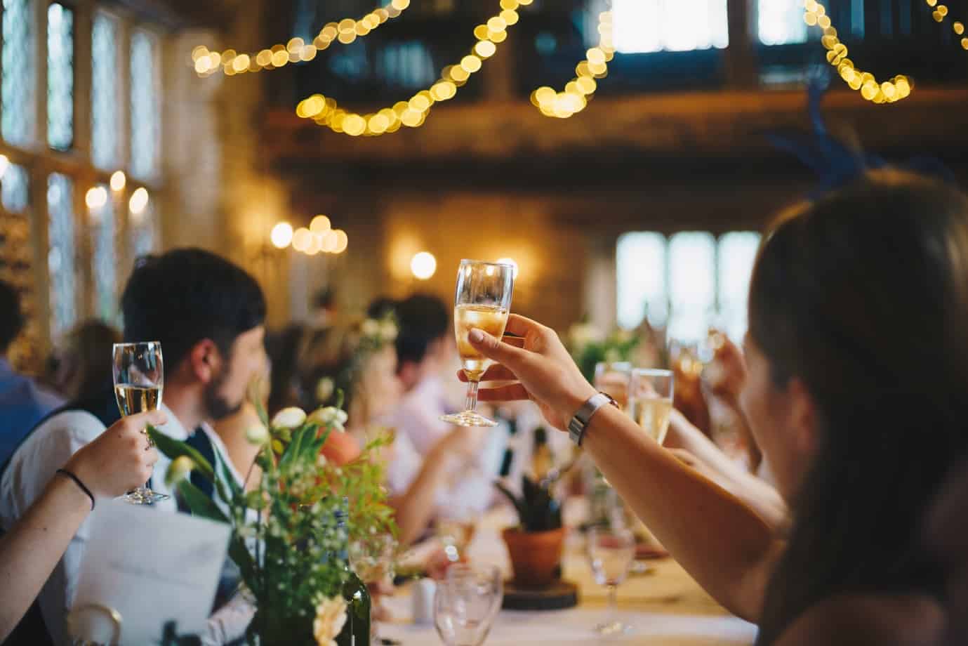A group of people drinking wine Description automatically generated with low confidence
