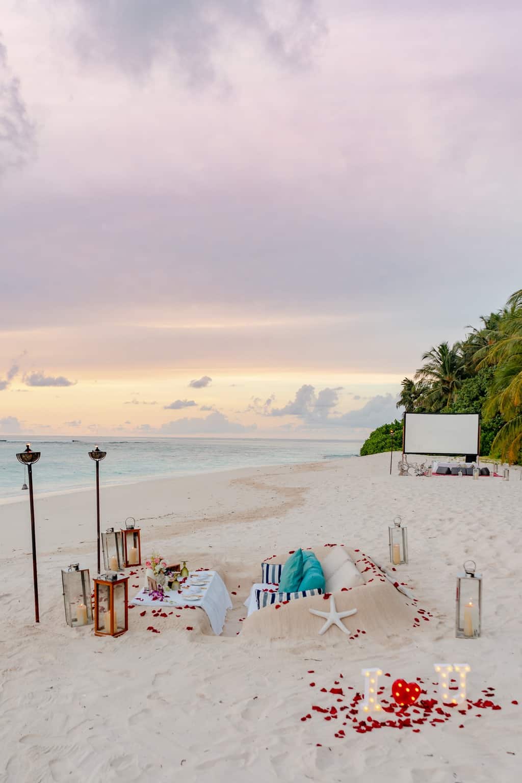 White and Blue Beach Umbrellas on Beach