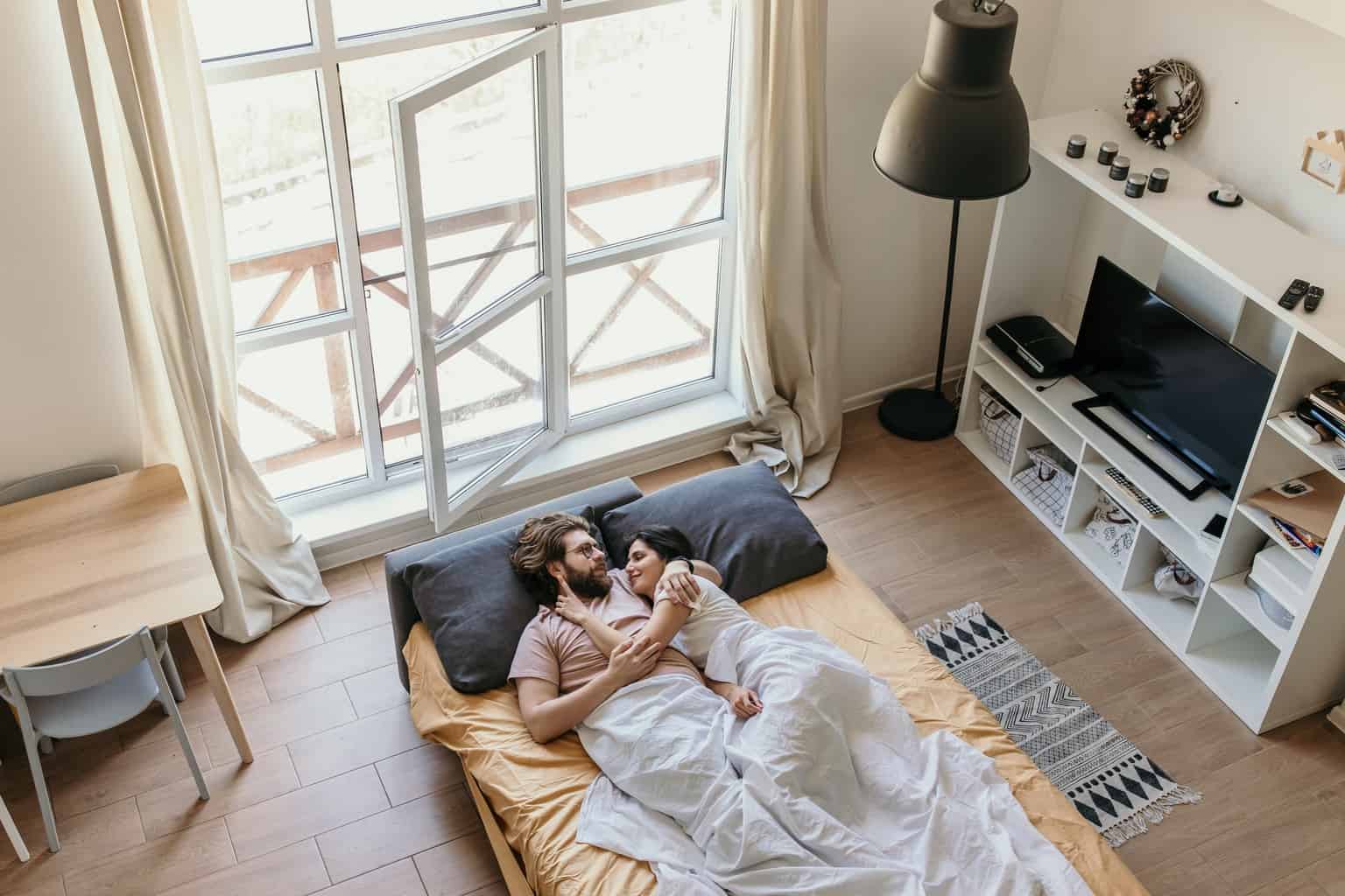 Couple Lying on Bed
