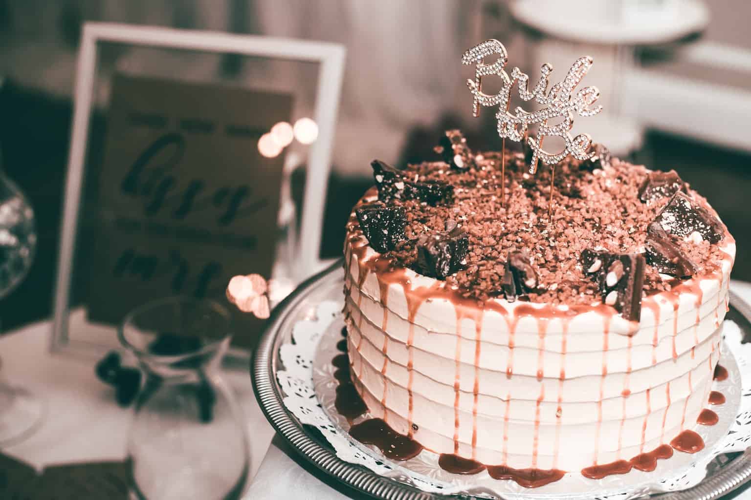 Vanilla Cake Topped With Chocolate And Syrup 