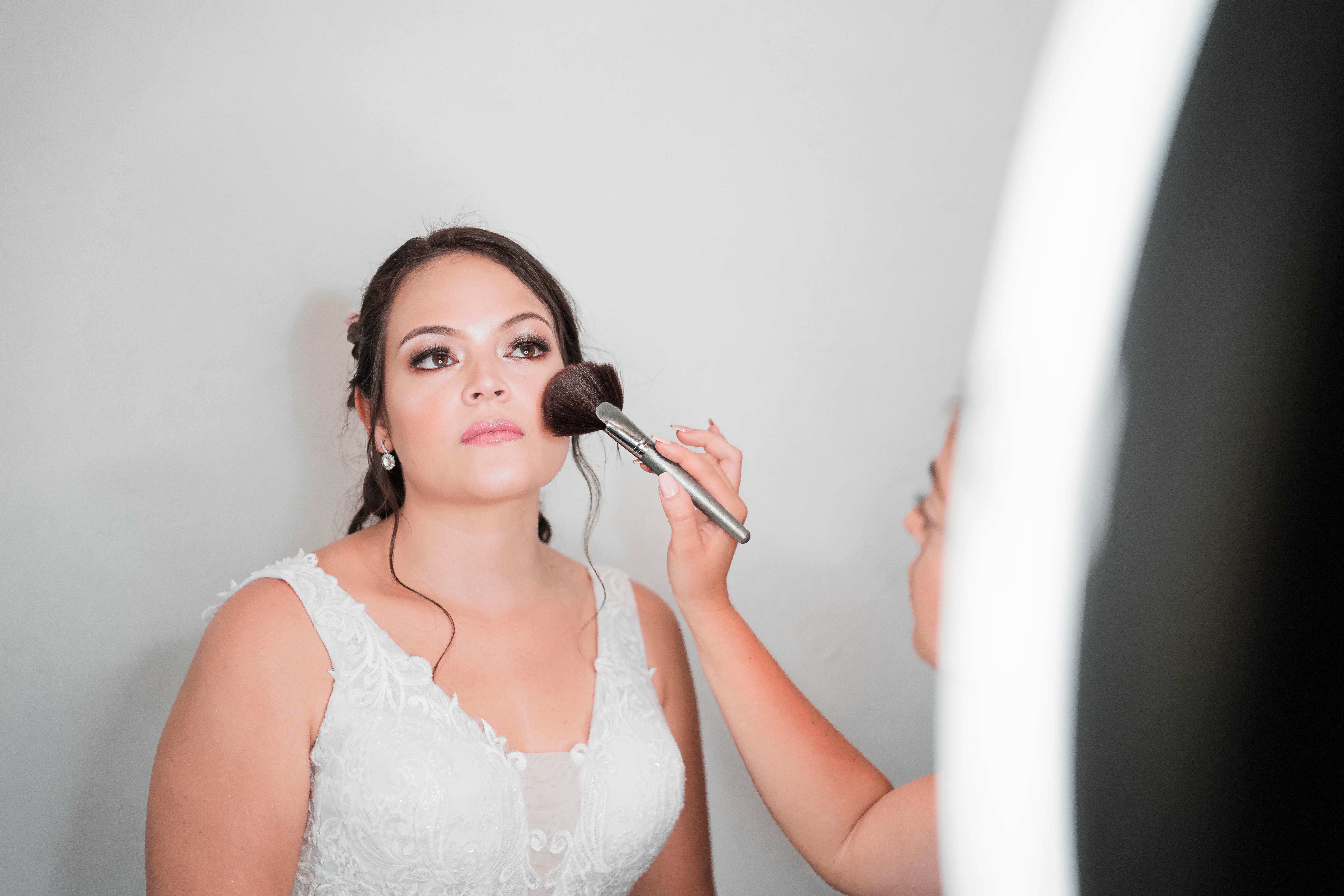 Free Woman in Bridal Dress Wearing Makeup Stock Photo