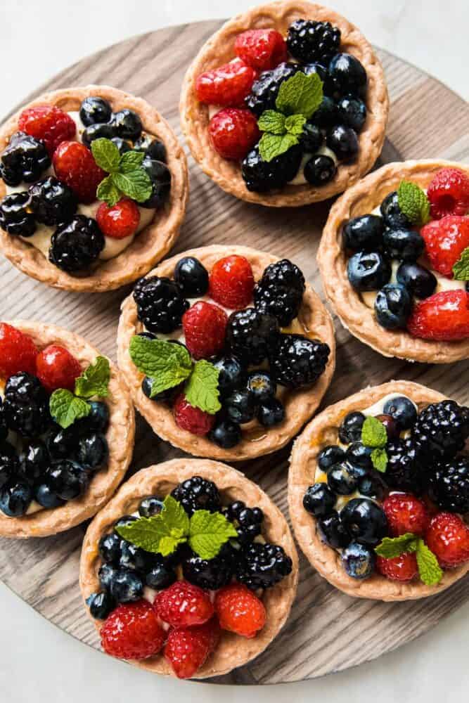 mini fruit tarts on serving board