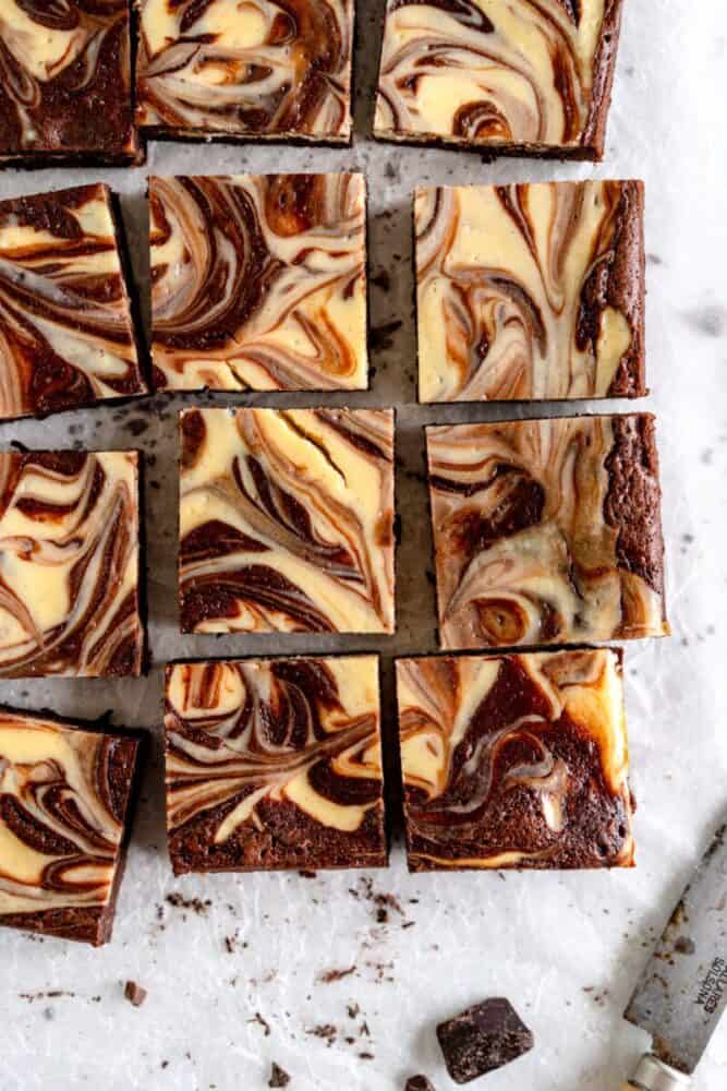 edge shot of cheesecake brownies with cheesecake swirl