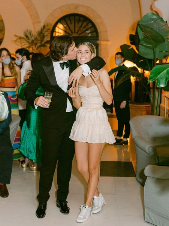 Bride wearing sneakers instead of heels