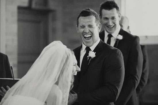 Funny wedding vows - Couple laughing at their own wedding vows