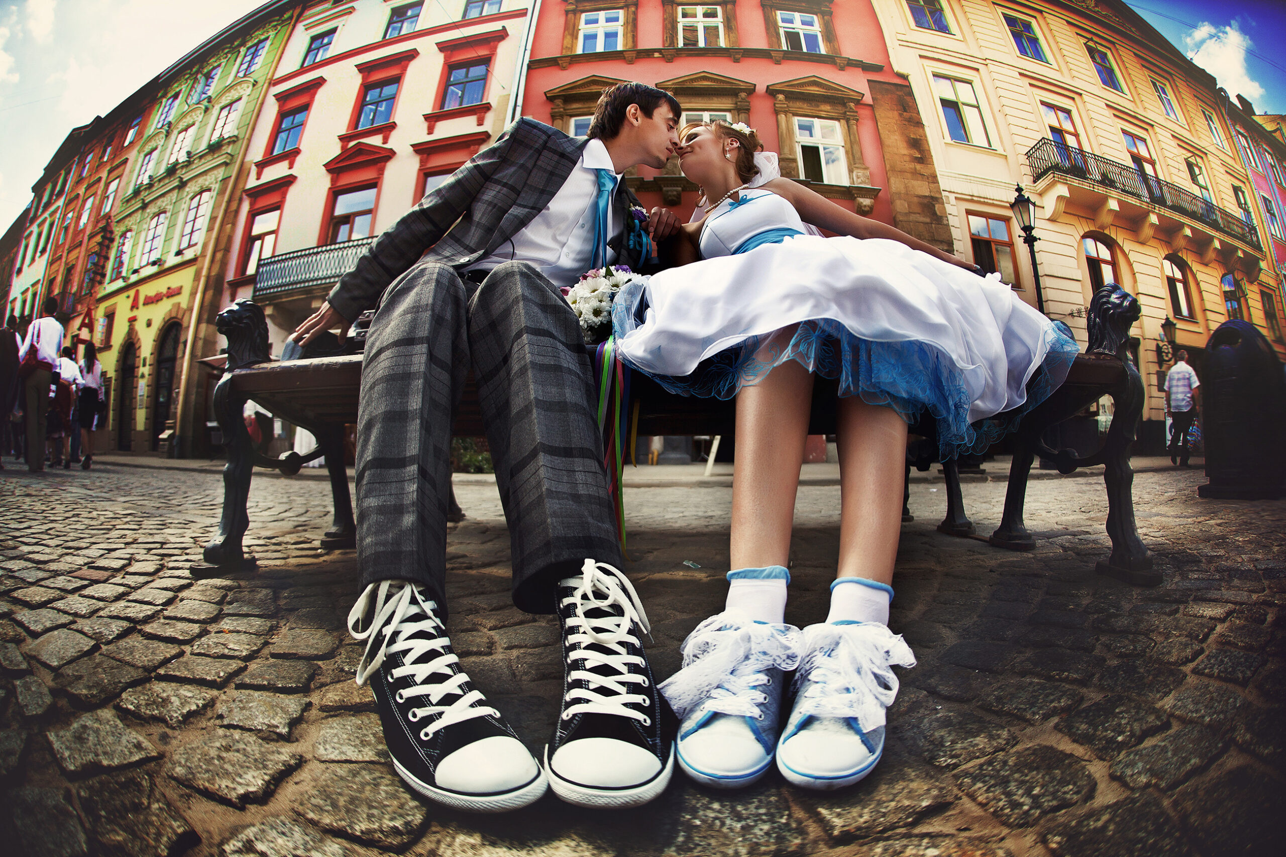 Bride and groom wearing sneakers