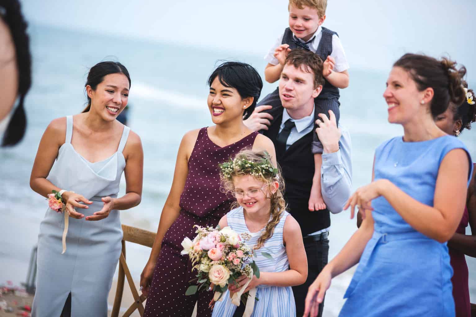 Guests laughing at funny wedding vows