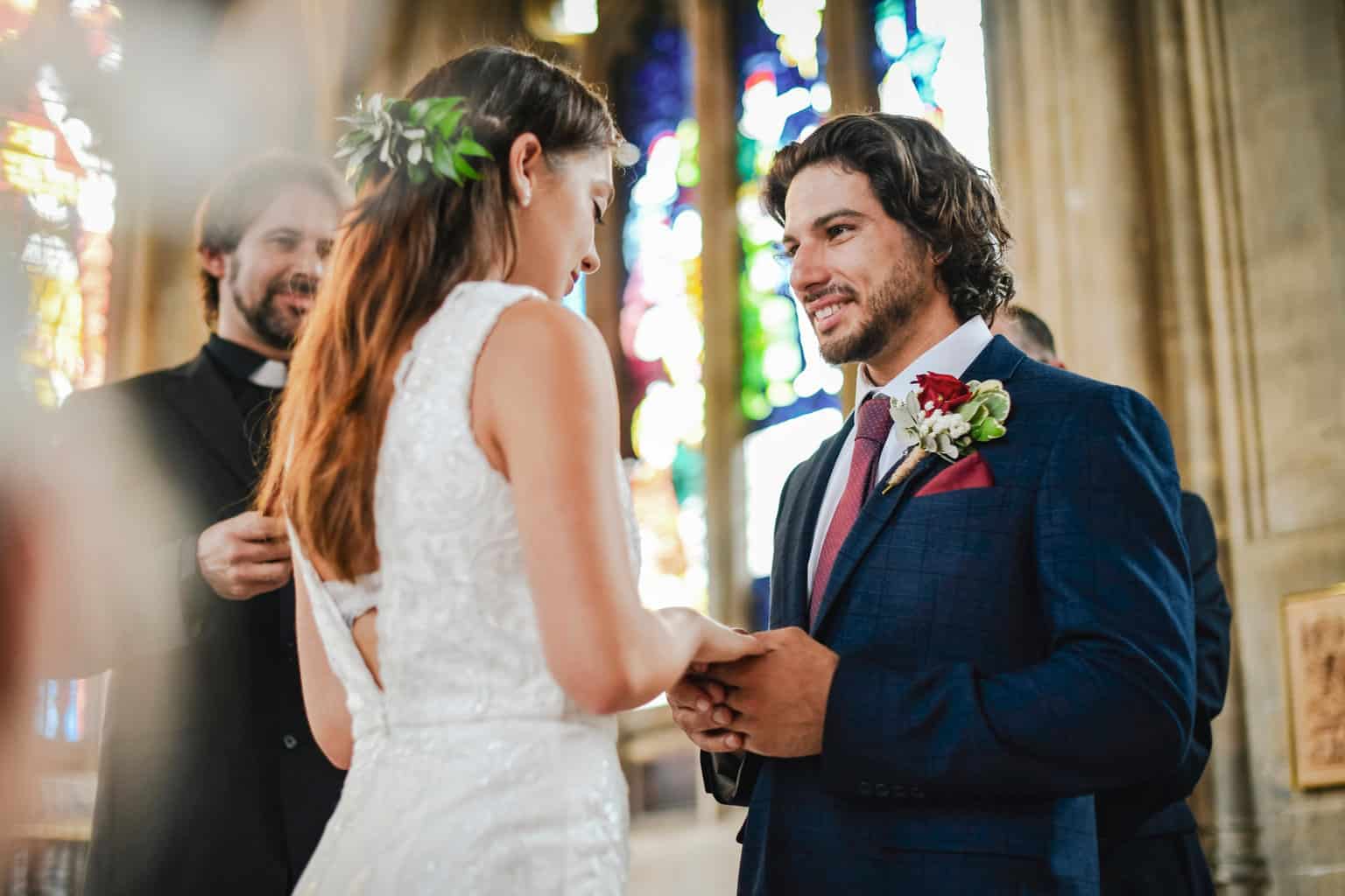 A couple reading their own vows.