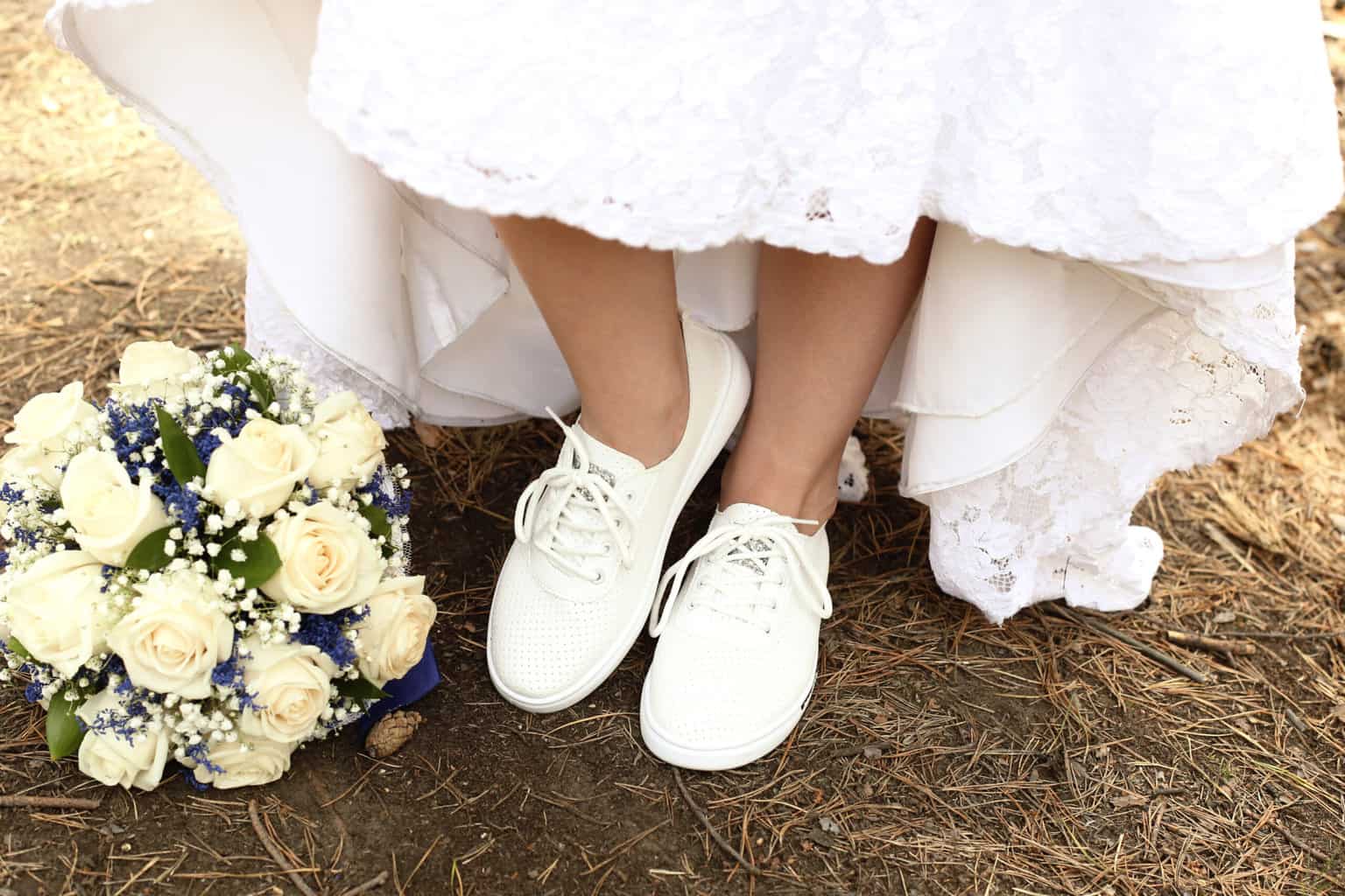 Bride wearing white sneakers