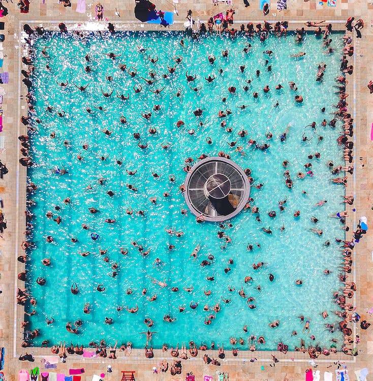 Free People Swimming At The Pool Stock Photo