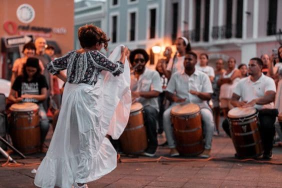 A picture of puerto ricans dancing to traditional latin music