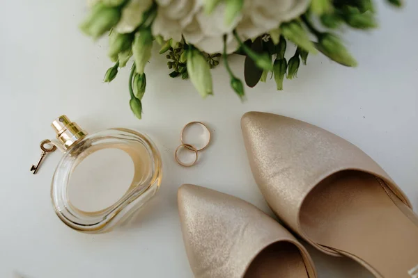 Two Gold Wedding Rings Flowers.