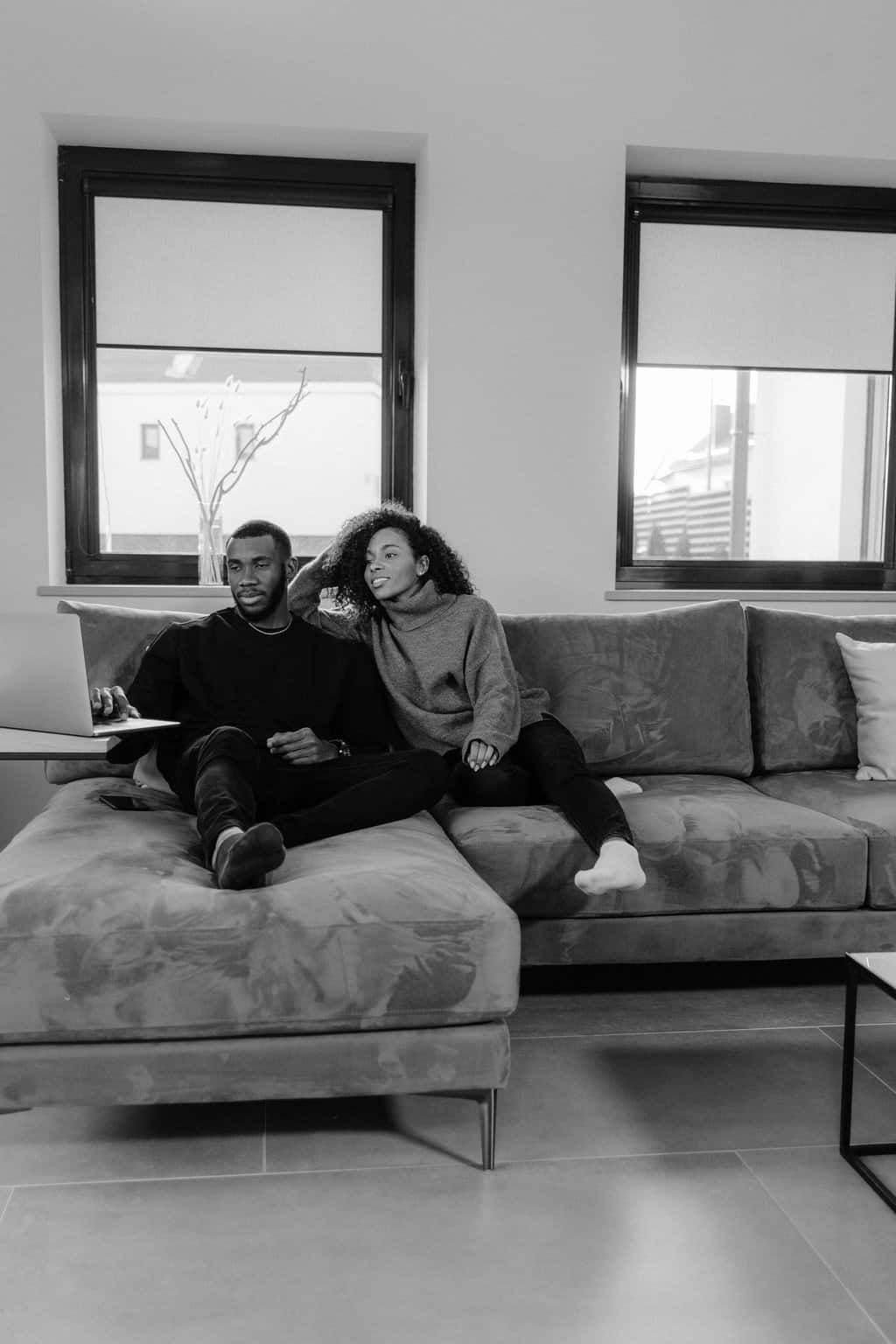 Free Grayscale Photo of 2 Women Sitting on Couch Stock Photo